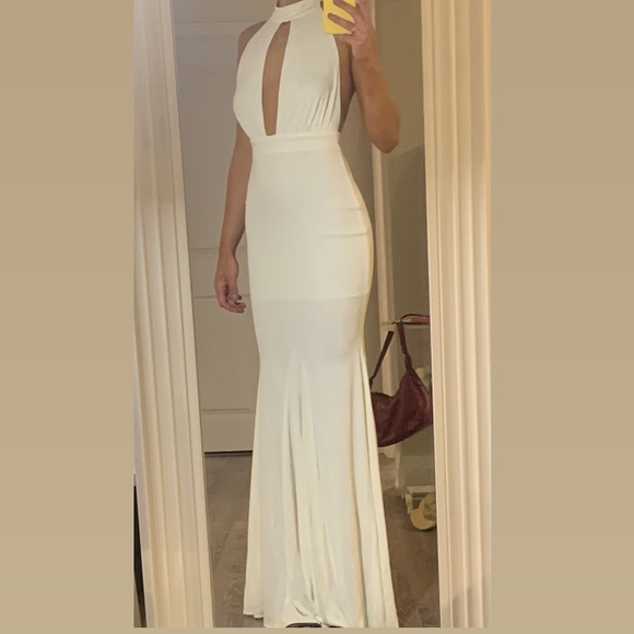 HONEY- ivory halter maxi formal dress with an open back and mermaid bottom. - Picture 1 of 7